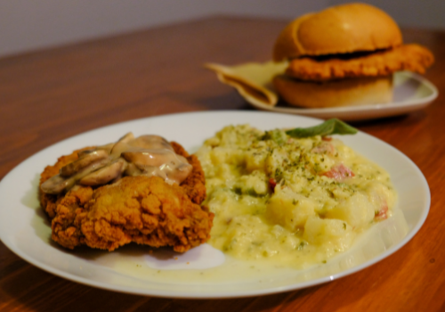 Schnitzel Haus Schnitzel Mushrooms and Mashed Potatoes and Schnitzel Sandwich Vancouver Christmas Market